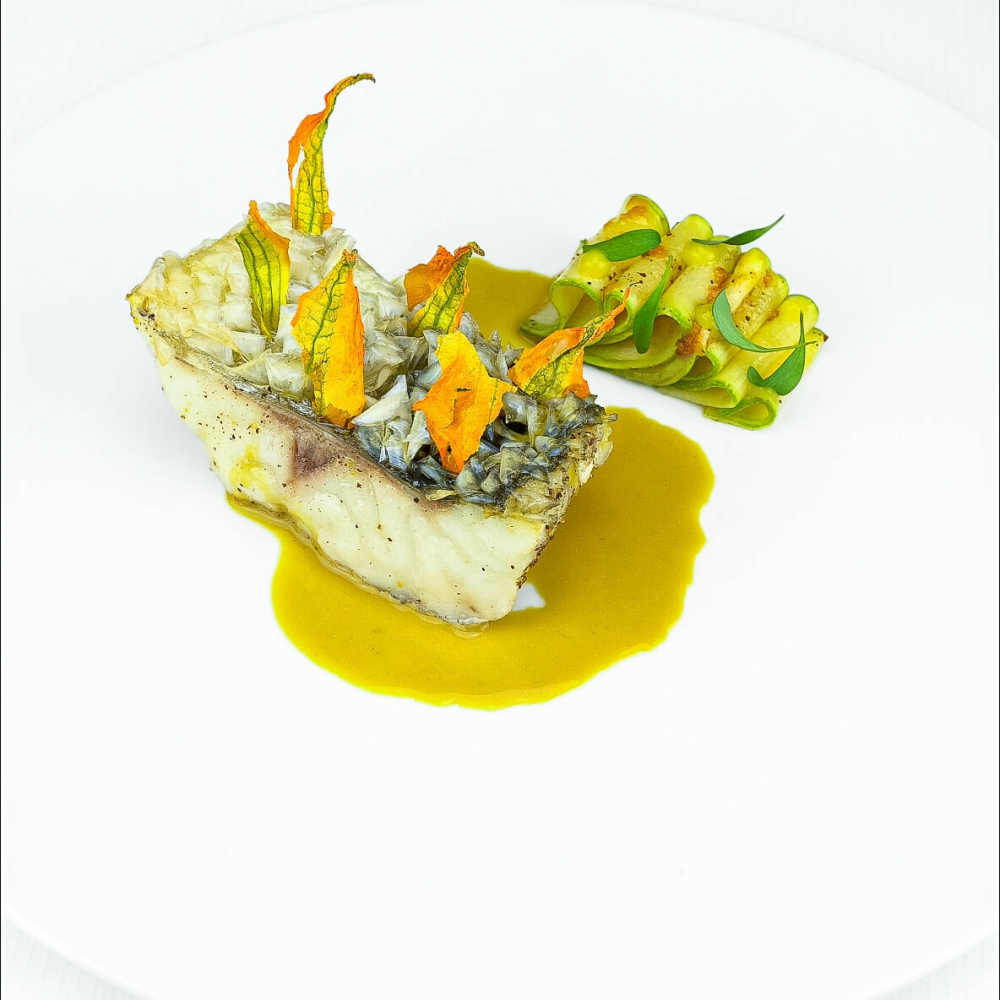 'Scale-on’ roasted sea bass, with a summer accompaniment